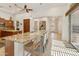 Spacious open-concept kitchen with an island and breakfast bar seating at 4229 E Nightingale Ln, Gilbert, AZ 85298