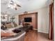 Cozy living room showcasing hardwood floors, a ceiling fan, and a dedicated entertainment area at 4817 W St Charles Ave, Laveen, AZ 85339