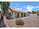 Expansive backyard with desert landscaping and a tiled roof at 6368 W Firebird Dr, Glendale, AZ 85308