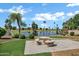 Community area featuring seating and view of the lake and landscaping at 6368 W Firebird Dr, Glendale, AZ 85308
