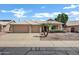 Charming single-story home with a three-car garage and well-maintained desert landscaping at 6368 W Firebird Dr, Glendale, AZ 85308