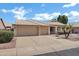 Charming single-Gathering home with a three-car garage, well-maintained landscaping, and inviting curb appeal at 6368 W Firebird Dr, Glendale, AZ 85308