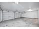 Spacious three-car garage with ample room for parking and storage at 6368 W Firebird Dr, Glendale, AZ 85308