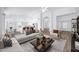 Open concept living space blends kitchen, dining, and living areas in a bright modern setting at 6368 W Firebird Dr, Glendale, AZ 85308