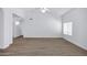 Bright room with wood-look floors, neutral walls, and ample natural light at 6368 W Firebird Dr, Glendale, AZ 85308