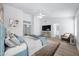Spacious main bedroom with plush decor, ceiling fan, and en-suite bath offering a calming retreat at 6368 W Firebird Dr, Glendale, AZ 85308