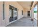 Covered patio featuring a sliding glass door and neutral colors at 6368 W Firebird Dr, Glendale, AZ 85308