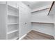 Well-organized walk-in closet with ample shelving and hanging space offers efficient storage solutions at 6368 W Firebird Dr, Glendale, AZ 85308