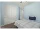Bedroom with double closet and doorway at 7620 W Pioneer St, Phoenix, AZ 85043