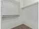 Walk-in closet with multiple shelves and rods for ample storage at 7620 W Pioneer St, Phoenix, AZ 85043