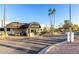 View of the gated community gatehouse entrance; Scottsdale Shadows Community Services at 7970 E Camelback Rd # 101, Scottsdale, AZ 85251