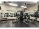 Well-equipped gym with various exercise machines and mirrored walls at 7970 E Camelback Rd # 101, Scottsdale, AZ 85251