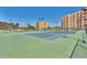 Well-maintained tennis courts surrounded by lush landscaping offer residents a great recreation space at 7970 E Camelback Rd # 101, Scottsdale, AZ 85251