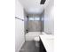 Stylish bathroom featuring a tiled shower-tub, modern fixtures, and updated vanity with storage at 8133 W Mclellan Rd, Glendale, AZ 85303