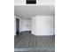 Bright living room with gray wood floors and white walls creates a modern, airy feel at 8133 W Mclellan Rd, Glendale, AZ 85303