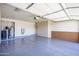 Spacious garage with sealed floors and plenty of cabinet storage at 8230 E Navarro Ave, Mesa, AZ 85209