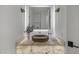 Modern bathroom with vessel sink, backlit mirror, and stylish sconces at 9441 N 129Th Pl, Scottsdale, AZ 85259