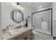 Stylish bathroom features modern lighting, fixtures, and tiled shower/tub combination at 9441 N 129Th Pl, Scottsdale, AZ 85259