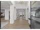 Grand foyer showcasing high ceilings, wood floors, and views of the living space at 9441 N 129Th Pl, Scottsdale, AZ 85259