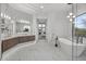 Bright bathroom with tub, shower, double vanity with granite counters and marble backsplash at 9441 N 129Th Pl, Scottsdale, AZ 85259