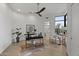 Bright home office with modern decor, ample workspace, and natural light at 9441 N 129Th Pl, Scottsdale, AZ 85259