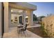 Inviting outdoor patio space with seating, landscaping, and a view of the pool at 9441 N 129Th Pl, Scottsdale, AZ 85259