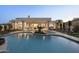 Expansive backyard showcasing a modern pool, spa, and lush landscaping for the perfect outdoor oasis at 9441 N 129Th Pl, Scottsdale, AZ 85259