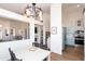 Dining area view showcasing open floor plan with a fireplace and kitchen access at 9791 N 118Th Way, Scottsdale, AZ 85259
