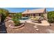 Relaxing backyard offers pool with spa, covered patio, desert landscaping, and lounge chairs at 10931 N 129Th Way, Scottsdale, AZ 85259