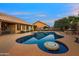 Backyard pool with tile detail, table setting and covered patio at 10931 N 129Th Way, Scottsdale, AZ 85259