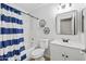 Clean bathroom featuring a shower-tub combo and a sleek vanity with modern finishes at 11330 W Eden Mckenzie Dr, Surprise, AZ 85378