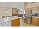 Open kitchen featuring stainless steel appliances and seamless flow to the adjacent living area at 11330 W Eden Mckenzie Dr, Surprise, AZ 85378