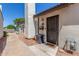 Charming front entrance featuring a secure gate, a welcoming mailbox, and a cozy doormat at 1174 E Belmont Ave, Phoenix, AZ 85020