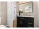 Stylish bathroom featuring a modern vanity, ample storage, and decorative accents at 12811 N 19Th Pl, Phoenix, AZ 85022