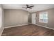 Inviting living room featuring durable flooring, a ceiling fan, and natural light at 12811 N 19Th Pl, Phoenix, AZ 85022