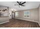 Bright living room boasts modern flooring and abundant natural light, creating a cozy atmosphere at 12811 N 19Th Pl, Phoenix, AZ 85022