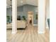 Spacious living area with high ceilings, neutral tones, and smooth flooring flowing into the hallway at 136 E Vera Ln, Tempe, AZ 85284