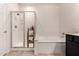 Bright bathroom featuring glass-door shower, soaking tub, and neutral tiling at 16800 E El Lago Blvd # 2076, Fountain Hills, AZ 85268