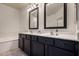 Stylish bathroom with dual sink vanity, black cabinets, and modern fixtures at 16800 E El Lago Blvd # 2076, Fountain Hills, AZ 85268