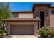 Beautiful home exterior featuring a two-car garage and well-maintained landscaping at 16800 E El Lago Blvd # 2076, Fountain Hills, AZ 85268