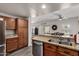 Functional kitchen with stainless steel appliances and an open view of the dining area at 16800 E El Lago Blvd # 2076, Fountain Hills, AZ 85268