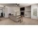 Cozy living room with a fireplace, built-in shelves, and ample natural light at 16800 E El Lago Blvd # 2076, Fountain Hills, AZ 85268