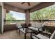 Charming patio with comfortable seating, ceiling fan, and scenic views at 16800 E El Lago Blvd # 2076, Fountain Hills, AZ 85268