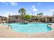 Community pool and recreational area with rock feature at 16800 E El Lago Blvd # 2076, Fountain Hills, AZ 85268