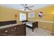 Bedroom with 2 beds and a ceiling fan at 1711 W Houston Ave, Gilbert, AZ 85233