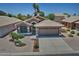Beautiful single-story home with tile roof, desert landscaping, and an attached two-car garage at 1741 S Clearview Ave # 13, Mesa, AZ 85209