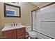 Cozy full bathroom featuring a shower and tub combo with tiled walls at 1741 S Clearview Ave # 13, Mesa, AZ 85209