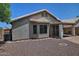Home exterior showcasing covered patio and mature landscaping at 1741 S Clearview Ave # 13, Mesa, AZ 85209