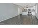 Open living room floor plan showcasing tiled floors and neutral gray walls at 1741 S Clearview Ave # 13, Mesa, AZ 85209
