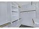 Organized walk-in closet with shelving and ample storage space at 1741 S Clearview Ave # 13, Mesa, AZ 85209